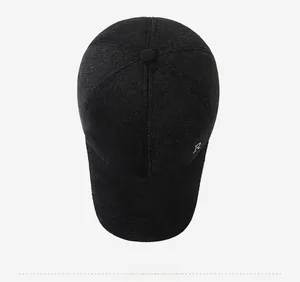 Top down view of a dark grey men's winter wool baseball cap with silver metal R logo