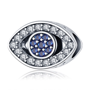 S925 sterling silver evil eye charm with blue and clear crystals on white background