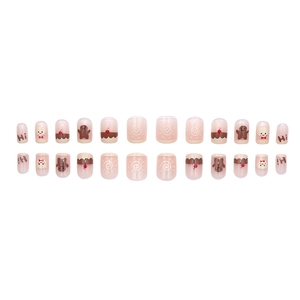 Short round fake nails featuring cute gingerbread man, white bear, and cherry patterns