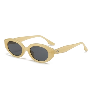 Vintage oval sunglasses with cream frames and grey lenses, stylish retro aesthetic