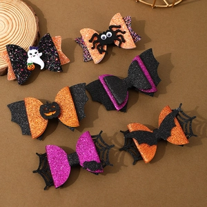 Set of 6 glitter Halloween hair bows with ghost, pumpkin, and spider designs on brown backdrop
