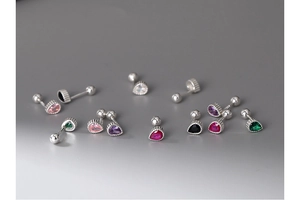 Macro shot of colorful pear-cut zircon earrings in S999 silver screw-back settings