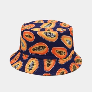 Close-up of tropical papaya pattern on navy blue bucket hat with reinforced brim