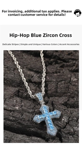 Macro detail of silver hip hop cross pendant with inlaid blue zircon stones on rope chain