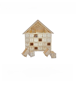 Detail of laser-engraved reindeer and snowflake patterns on the wooden advent calendar