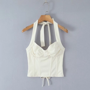 White corset top with halter neck straps, ribbed detailing and tie-up hem detail