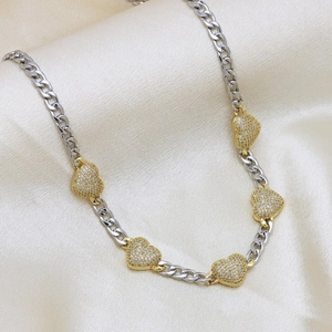 Silver Cuban chain necklace with five gold heart pendants and shimmering cubic zirconia
