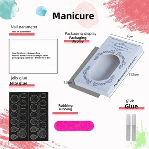 Short round Christmas press-on nail kit with 24 pieces, glue, and file in a window box