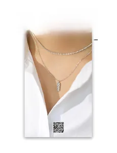 Detail of silver double layer choker with geometric rectangle pendant and zircons