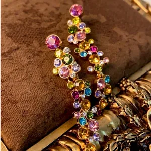 Elegant gold drop earrings with multicolored crystal tassels and wheat ear design