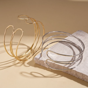 Minimalist multi-layer geometric wire open bracelet in polished gold and silver finish