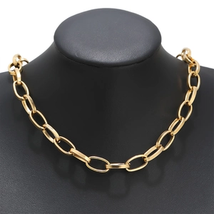 Detailed close-up of 8mm golden stainless steel square link chain on a model neck