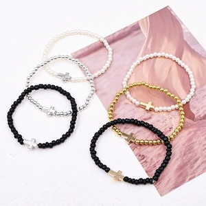 Three-piece stretch beaded bracelet set with cross pendant and faux pearls for women