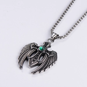 Vintage steel angel wing pendant with green zircon gemstone and silver chain necklace