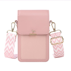 Pink crossbody phone bag with textured leather and trendy zigzag pattern wide strap