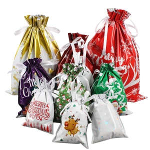 Christmas drawstring gift bag set with festive reindeer and snowflake holiday patterns
