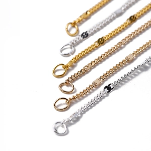 Close-up of gold and silver plated metal chains with lobster clasps for DIY jewelry making