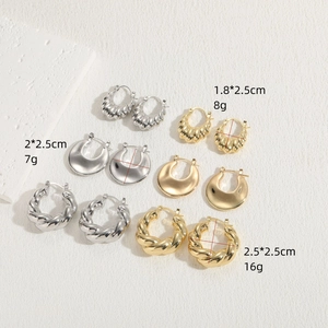 Gold and silver 14K plated geometric hoop earrings in twisted and crescent designs