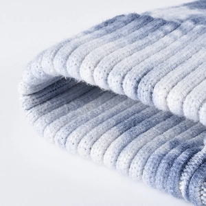 Winter tie-dye rib knit beanie hat in blue and white gradient color for outdoor warmth