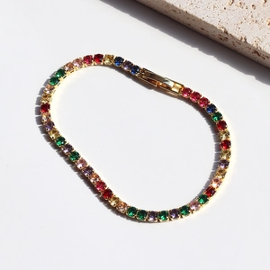 Chic gold tennis bracelet with colorful square zircon stones on white background