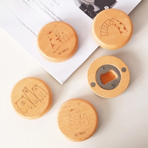 Detailed view of round wooden bottle opener with cat engravings and magnetic back