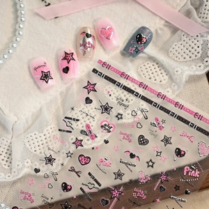 Pink and black sweet goth nail stickers with heart and star patterns on lace background