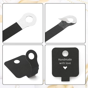 Detail of self-adhesive black jewelry display cards with Handmade with love print