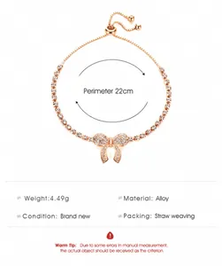 Detail of rose gold bow bracelet with adjustable slider and sparkling crystal inlay