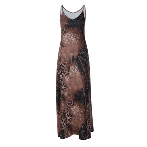 Detail of the slim-fit leopard print maxi dress with tie-up straps and V-neckline