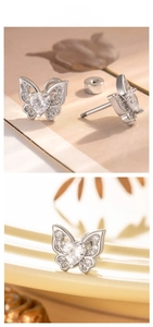 Detail of butterfly stud earring with heart zircon and screw back for secure fit