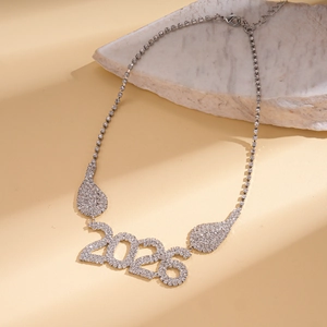 Detail of 2025 rhinestone pendant necklace with tennis chain and teardrop accents