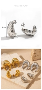 Detailed size view of spiral horn-shaped C-earrings in gold and silver finishes
