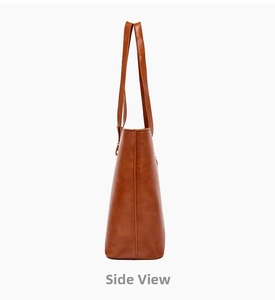 Detailed side view of brown faux leather tote bag showing vertical stitching and texture