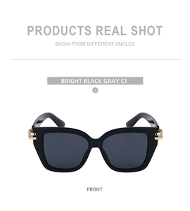 Vorderansicht der glänzend schwarzen quadratischen Sonnenbrille mit Golddetails