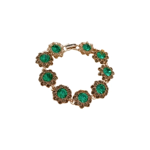 Vintage gold-plated floral bracelet featuring emerald green rhinestones in a circular layout