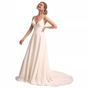 Elegant white chiffon wedding dress with thin straps, deep V-neck and long train