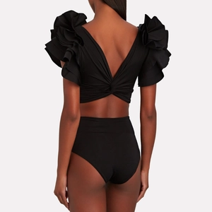 Detailed back view of high waisted bikini with tiered ruffles and knotted cross detail