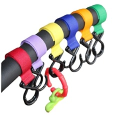 Close-up of colorful baby stroller hooks with durable fabric straps in six vibrant shades