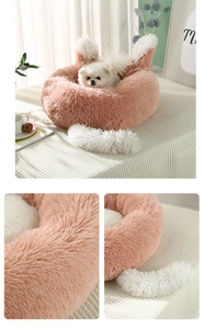 Detail view of plush pet bed with soft faux fur texture and cute animal ear design