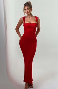 Detail of red slim-fit maxi dress featuring a wide square neckline and ribbed knit texture
