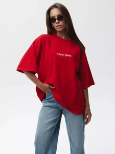 Close-up of Only Jesus white letter print on a red oversized heavy cotton T-shirt