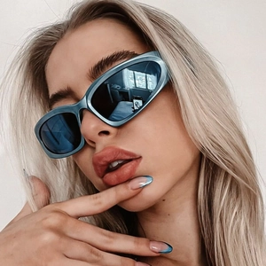 Futuristic blue metallic Y2K steampunk sunglasses for women in sporty wrap-around style