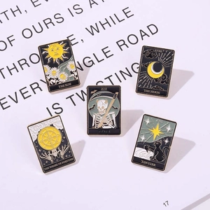 5-piece Tarot enamel pin set featuring Sun, Moon, and Star in black and gold alloy