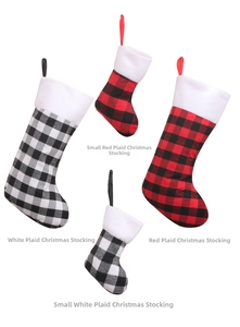 Set of Christmas stockings in red and black plaid patterns for holiday decorations
