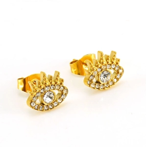 Close-up of gold-plated titanium steel evil eye stud earrings with sparkling zircons
