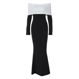 Detail of the black and white contrast off-shoulder sleeves on the long evening gown