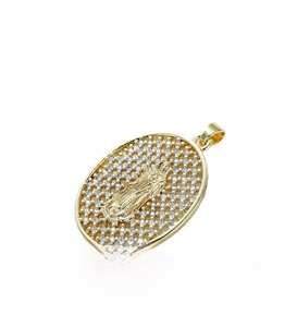 Detailed view of an oval Virgin Mary pendant with gold plating and cubic zirconia borders