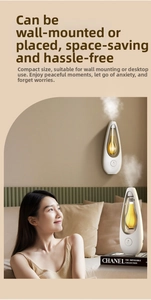 Detail of white water drop aroma diffuser with warm light showing wall mount and desk modes