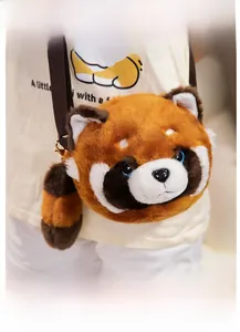 Detail of red panda plush crossbody bag with soft faux fur and adjustable strap