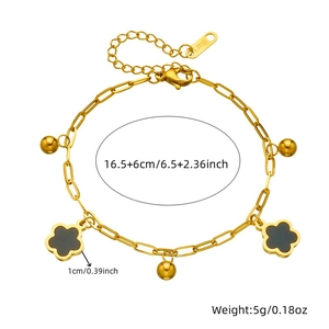 Gold stainless steel chain bracelet with black flower pendant and adjustable sizing